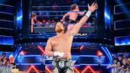 With a prone Bryan left laying behind, Murphy celebrates his huge win on SmackDown